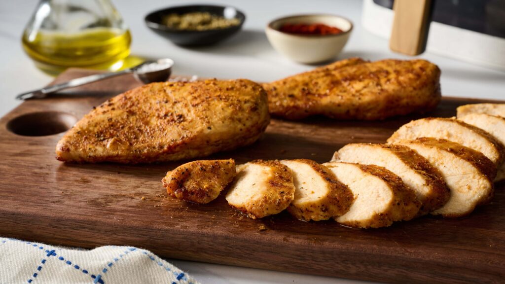 Before and after air fryer chicken breast recipe showing dry vs juicy texture