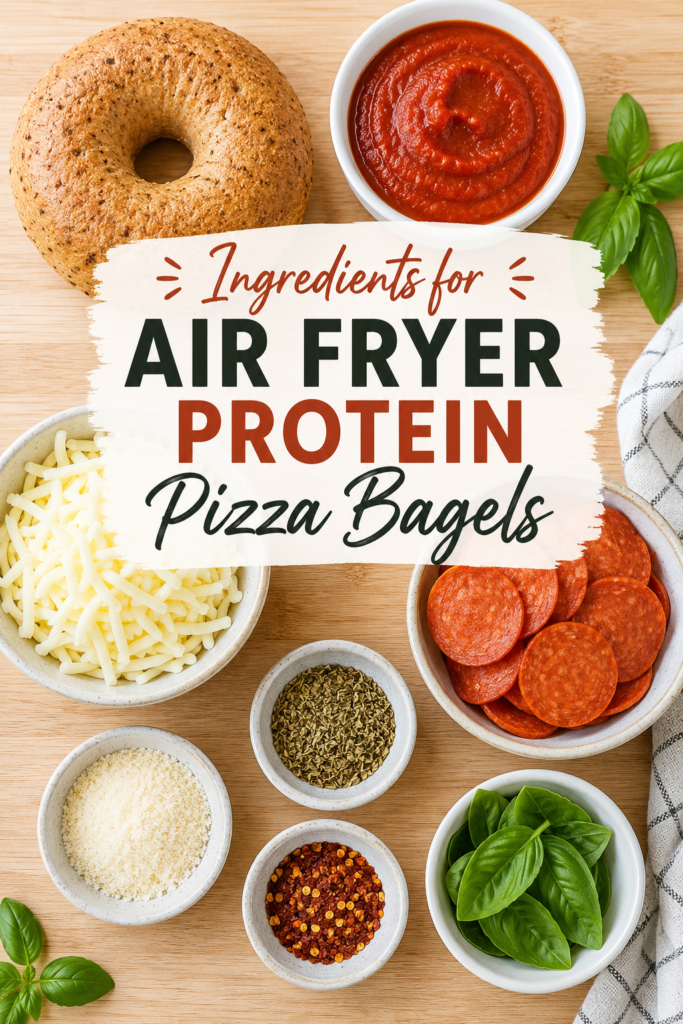 Whole wheat bagel, mozzarella cheese, pizza sauce, turkey pepperoni, Parmesan cheese, oregano, and spices arranged for Air Fryer Protein Pizza Bagels.
